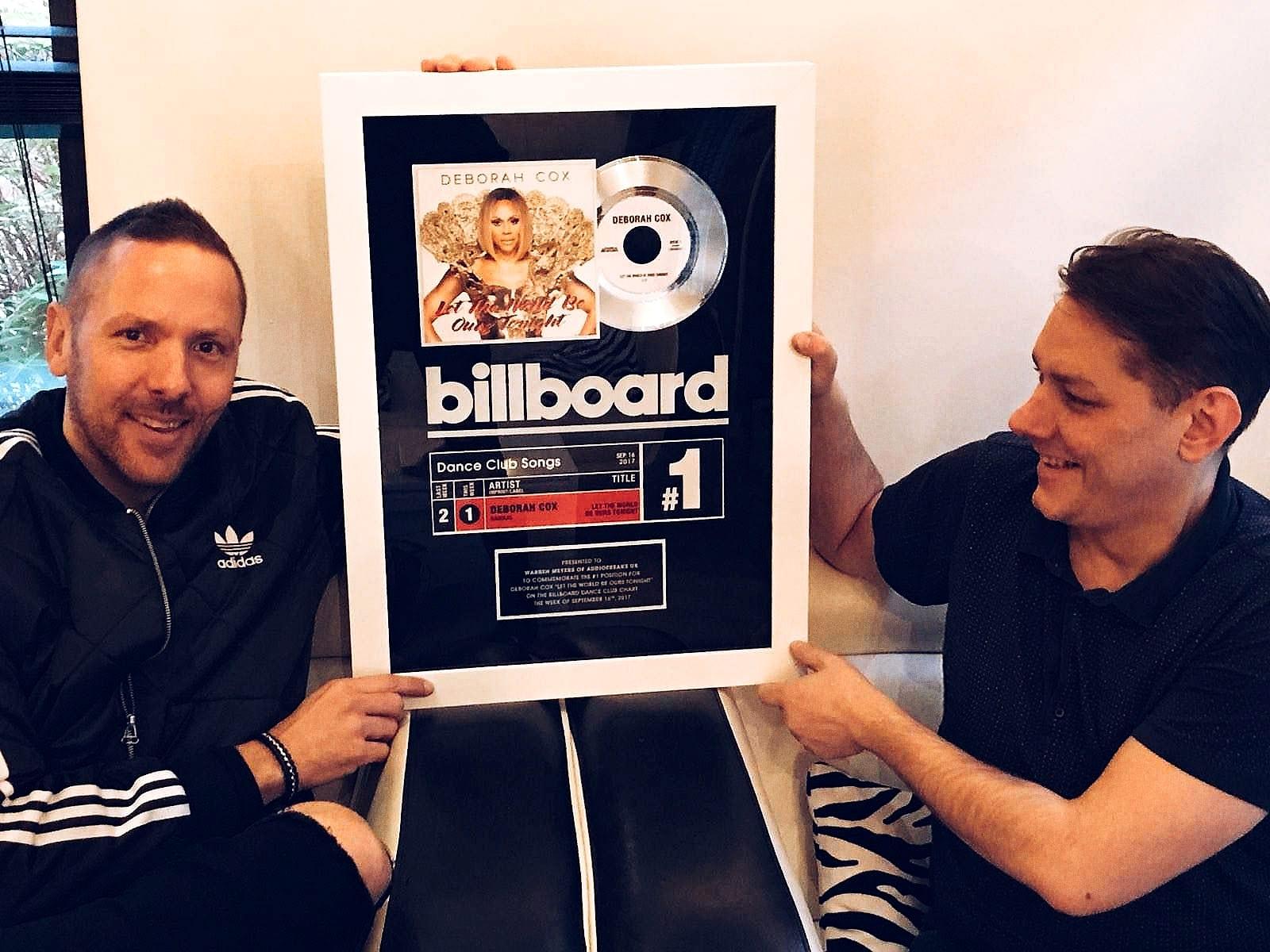 Matt and Warren holding the framed Billboard #1 plaque for Deborah Cox